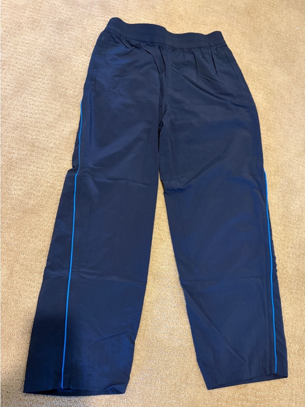 Athleta Navy Joggers with Bright Blue Side Piping- never worn , pockets with zip